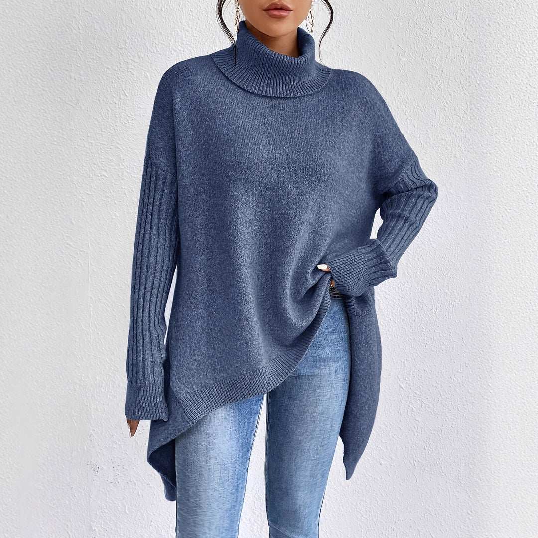 Women's oversized knit sweater with high turtleneck, ribbed sleeves, and asymmetric hem Mune Fashion
