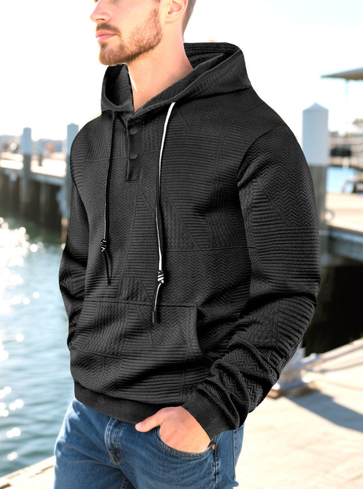 Men's hooded sweatshirt with geometric structure, Henley placket, and kangaroo pocket Mune Fashion