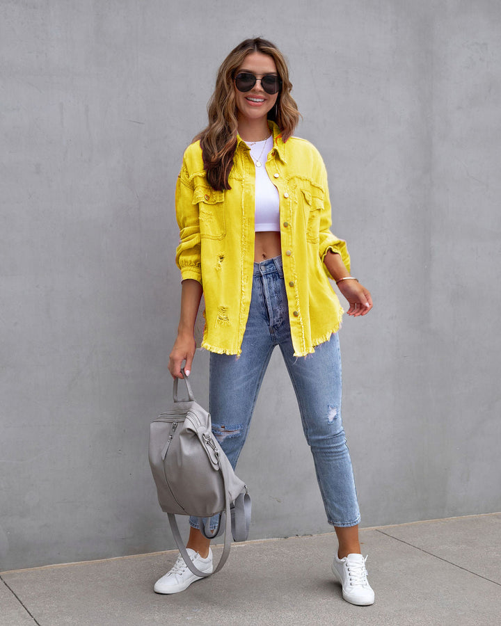 Women's oversized utility denim shirt jacket with fringe trim and patch pockets Mune Fashion