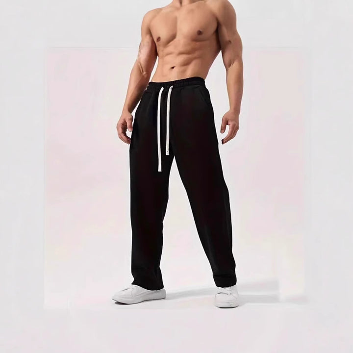 Men's casually fitting sweatpants made of cotton blend with elastic waistband and side pockets Mune Fashion