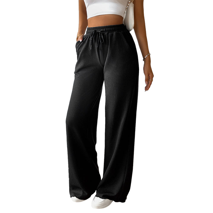 Women's wide lounge pants with elastic waistband, drawstring and side pockets Mune Fashion