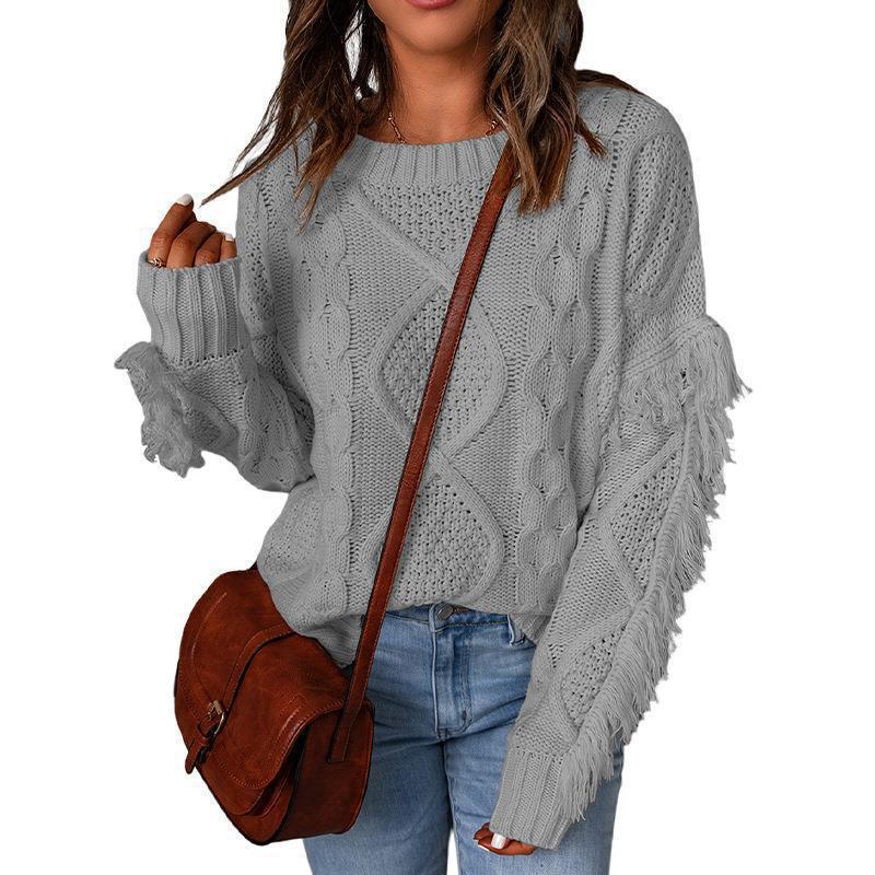 Women chunky knit sweater with cable knit structure, fringed sleeves and casual oversized fit Mune Fashion