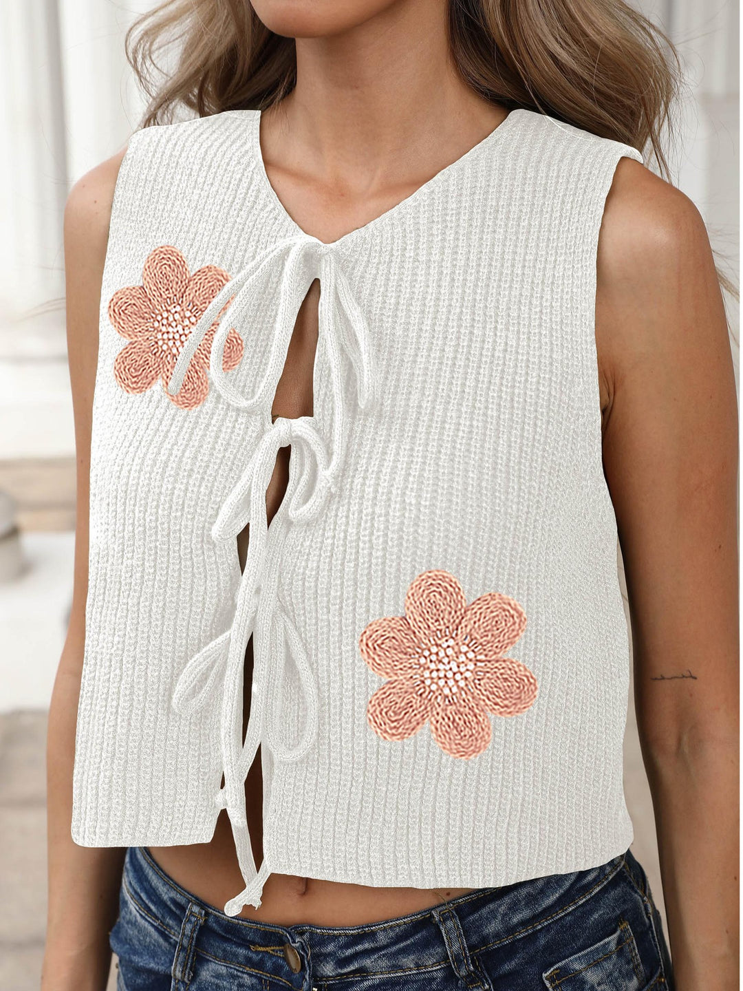 Ladies short knit top with floral appliqués Mune Fashion