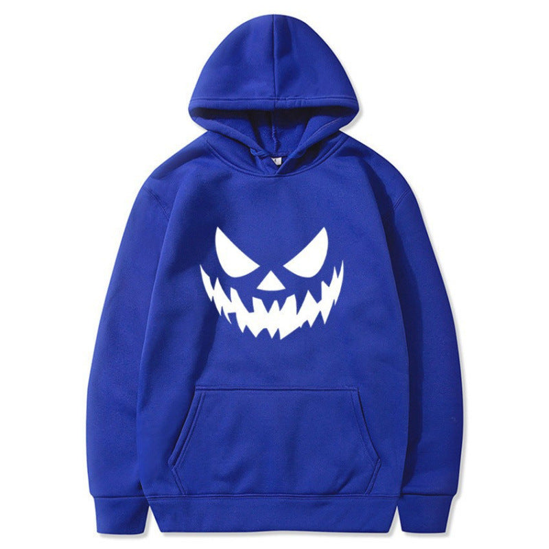 Unisex hooded sweatshirt with creepy pumpkin face print and oversized kangaroo pocket Mune Fashion