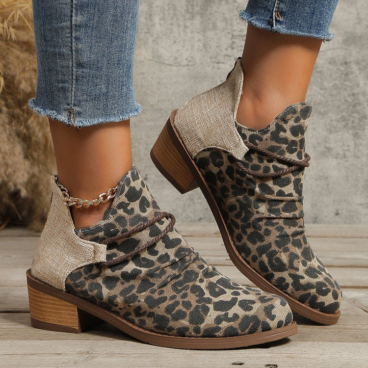 Women’s ankle boots with leopard print, canvas upper material, decorative braided strap, and low block heel Mune Fashion