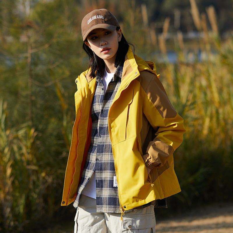 Women two-layer water-repellent outdoor jacket with hood, waist adjustment and contrast piping Mune Fashion