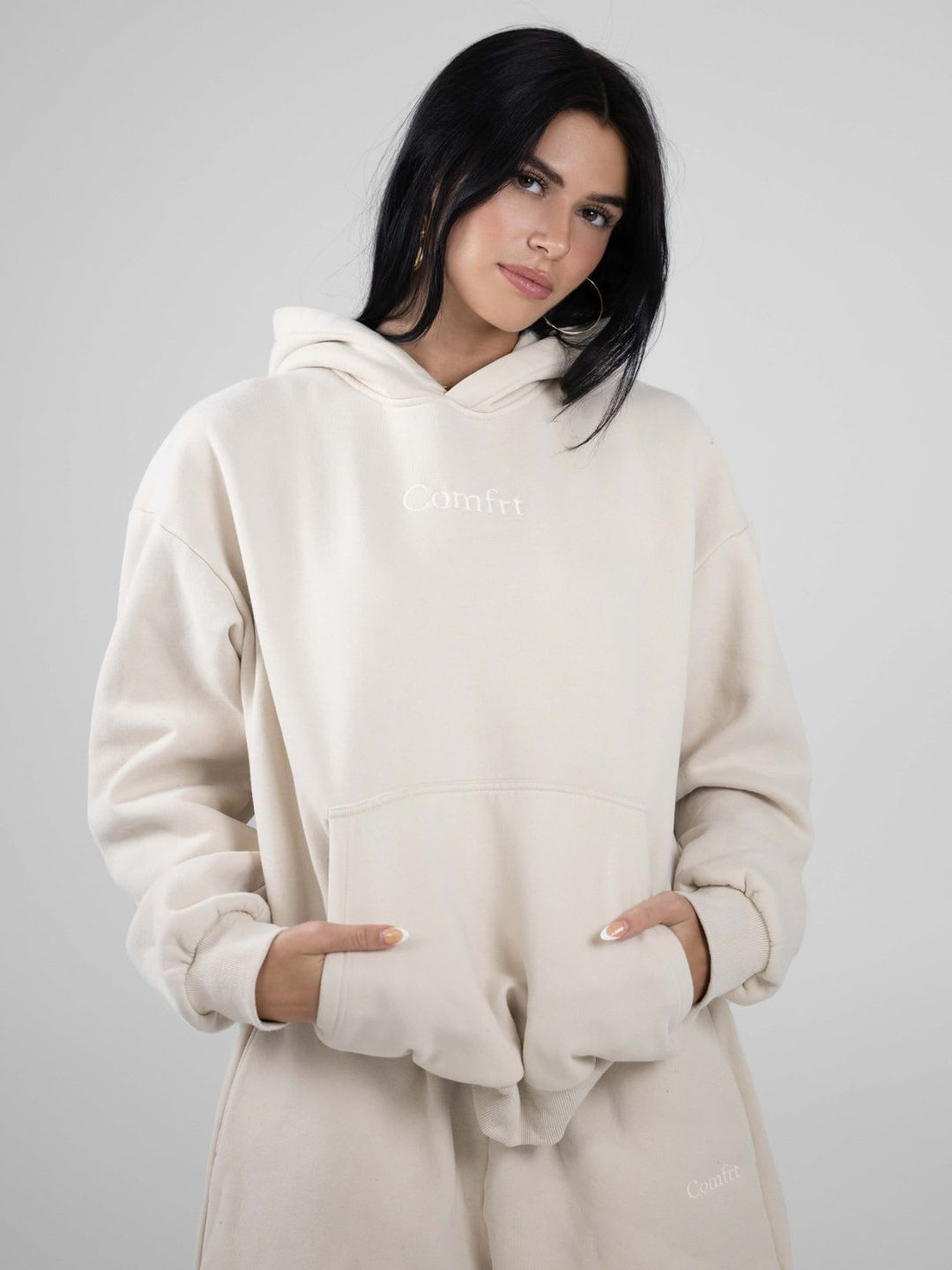 Women's casual sweatpants with high waistband, side pockets and elastic cuffs Mune Fashion