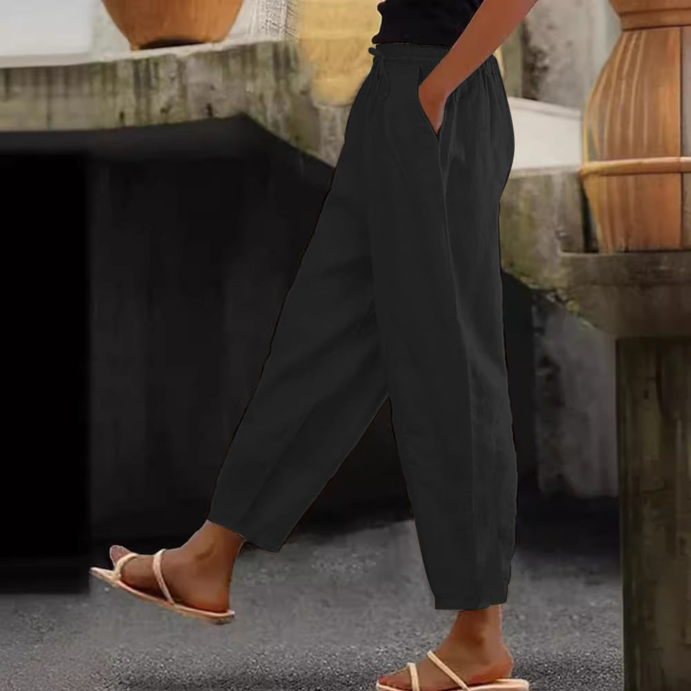 Women's loose-fitting linen blend pants with elastic waistband, drawstring, and angled side pockets Mune Fashion