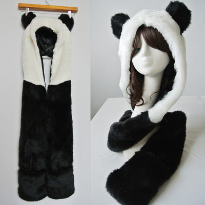 Ladies hooded stole made of luxurious faux fur with long scarf tails and pompom ends Mune Fashion