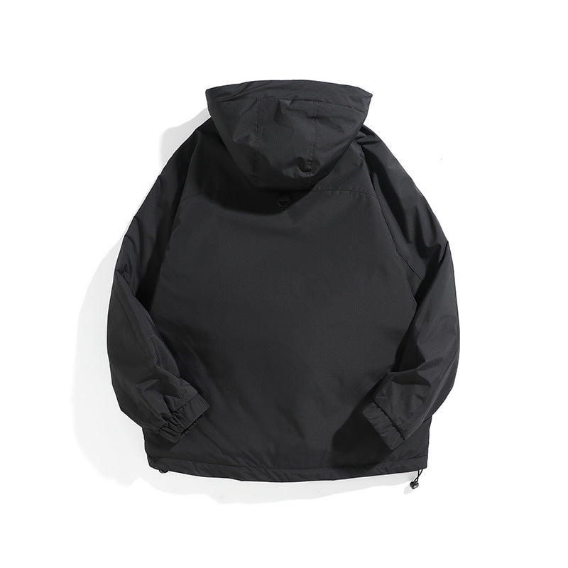 Unisex Wide cut weatherproof parka with hood, drawstring and patch pockets Mune Fashion