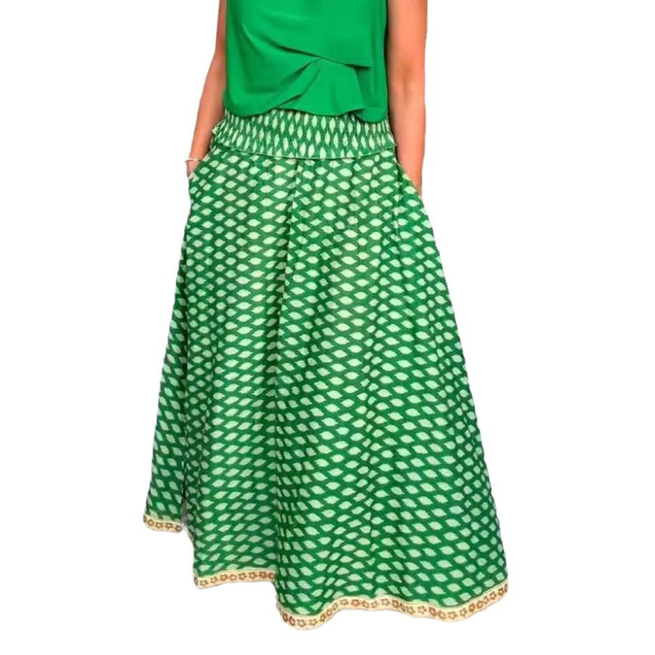 Women's two-piece halter neck set with gathered stand collar and patterned maxi skirt with elastic smocked waistband Mune Fashion