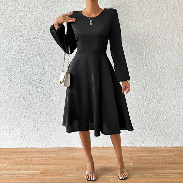 Women's elegant midi dress with tailored corset look, flared A-line skirt, and long flared sleeves Mune Fashion