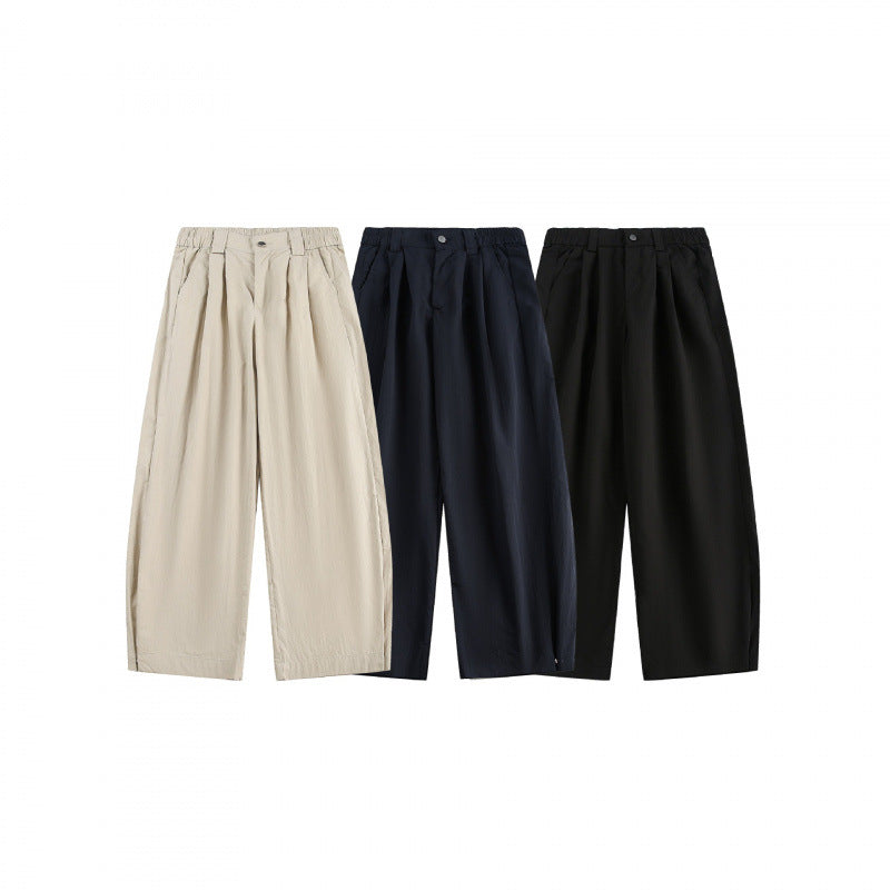 Women's wide high-waisted culotte pants with pleats, elastic waistband, and side pockets Mune Fashion