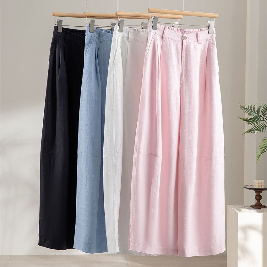 Women's wide linen-look trousers with high waist, crease and elastic back Mune Fashion