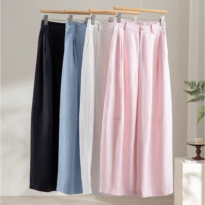 Women's wide linen-look trousers with high waist, crease and elastic back Mune Fashion
