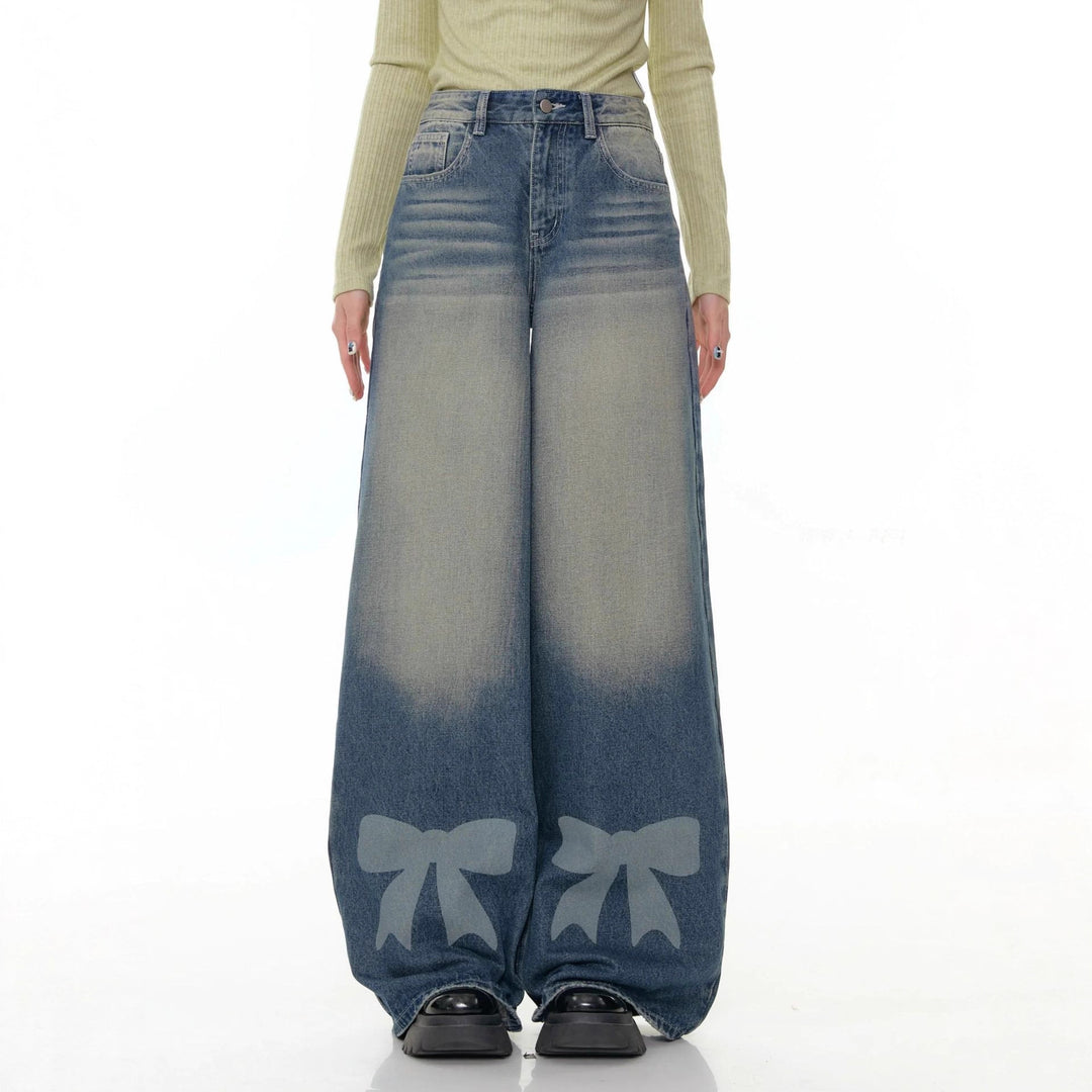 Women's high-waisted Palazzo pants made of denim with extra wide leg and bow print Mune Fashion