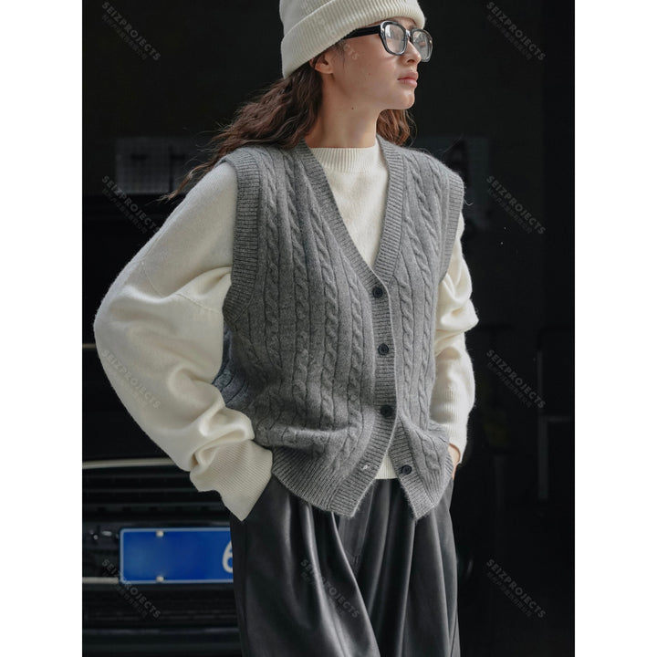 Women's chunky knit cable vest with deep V-neck and button placket Mune Fashion