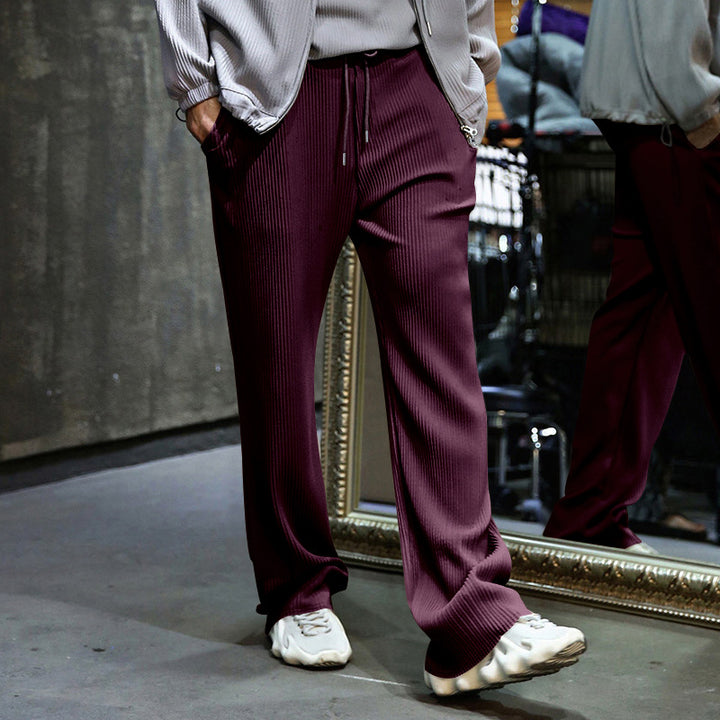 Men's loosely cut pleated trousers with drawstring and wide leg Mune Fashion