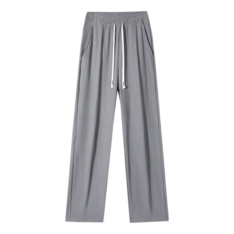 Women's wide linen-look trousers with elastic waistband, drawstring & side pockets Mune Fashion
