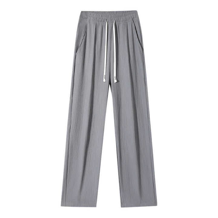 Women's wide linen-look trousers with elastic waistband, drawstring & side pockets Mune Fashion