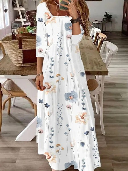Women's Flowing Maxi Dress with Three-Quarter Sleeves, Boat Neck and Floral Allover Print Mune Fashion