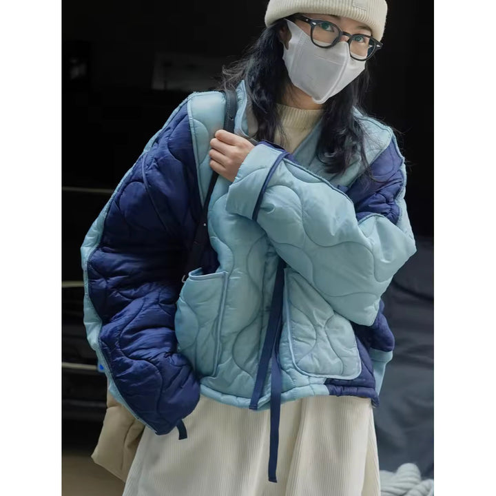Women's Padded Oversized Quilted Jacket with Contrasting Sleeves and Button Placket Mune Fashion