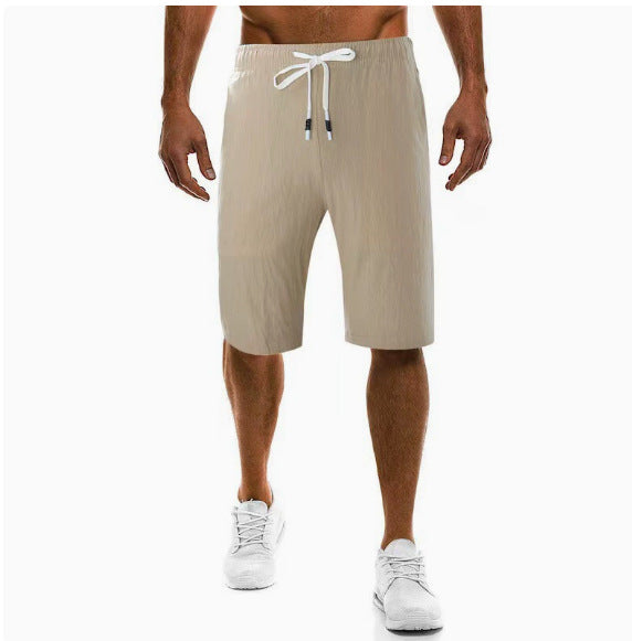 Men's light linen pants with elastic waistband, wide leg, and side pockets Mune Fashion
