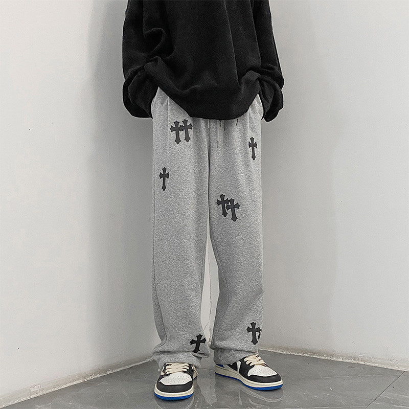 Men's wide cotton jogging pants with all-over cross print and elastic drawstring waistband Mune Fashion