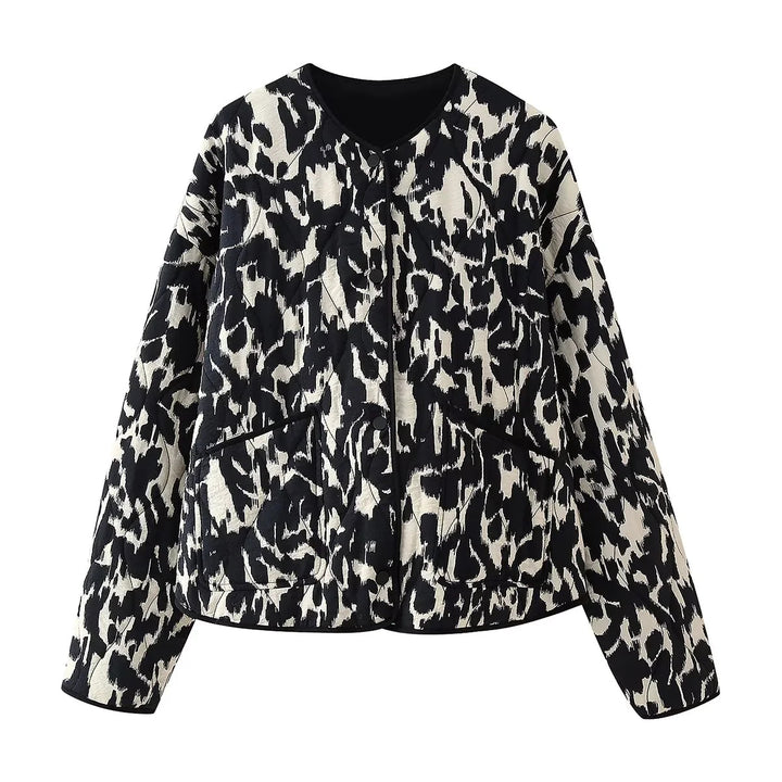 Ladies' quilted short jacket with abstract textured print, lightweight thermal padding, and contrasting piping Mune Fashion