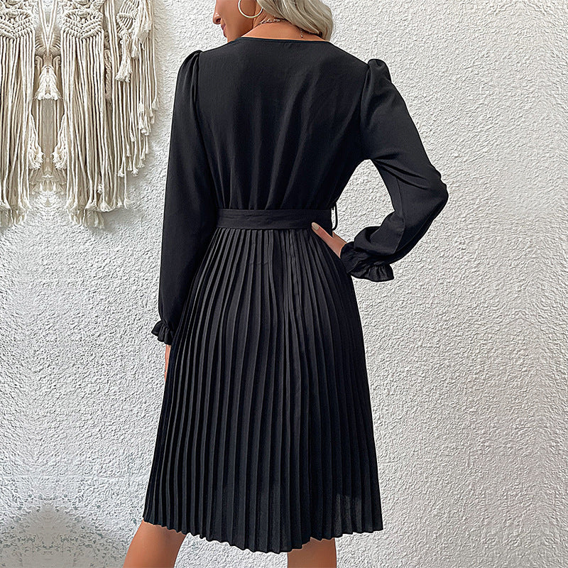 Women's midi dress with V-neck, fitted tie belt, and pleated skirt Mune Fashion