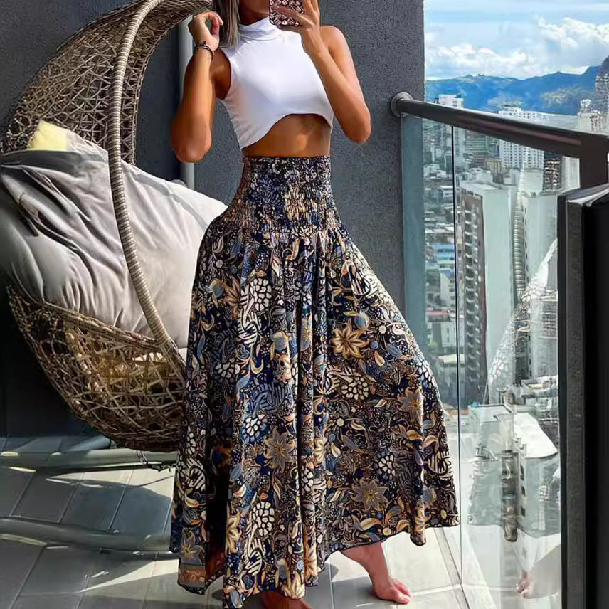 Ladies nan maxi skirt with high smocked waist and flowing boho pleated look Mune Fashion