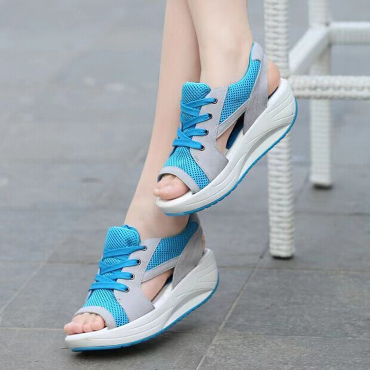 Women's sporty wedge sandal in sneaker style with breathable mesh, padded comfort insole, and open toe area Mune Fashion