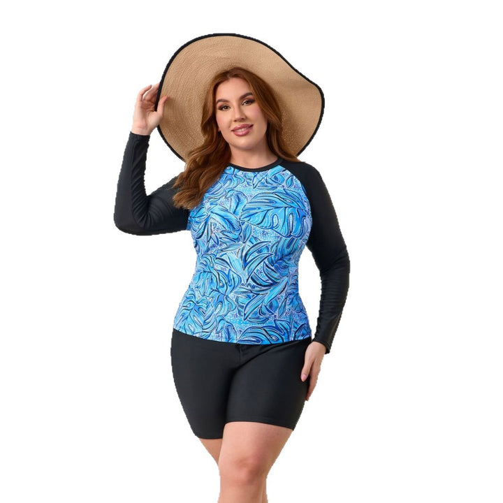 Damen Sportlicher Rashguard mit floralen Mustern und kurzen Hosen Echo Archiv