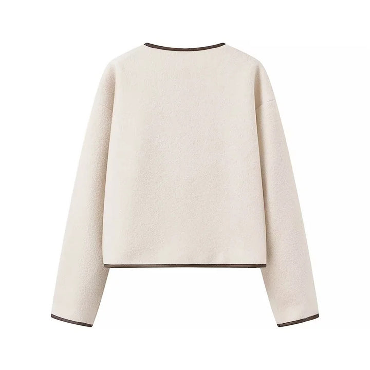 Women short-cut teddy jacket with double-tied bow closure, round neck and contrast piping Mune Fashion