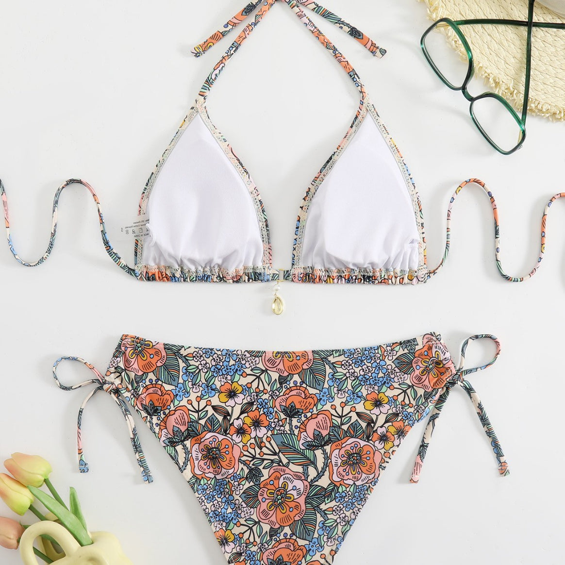 Women's bikini set with playful floral pattern and adjustable straps Mune Fashion