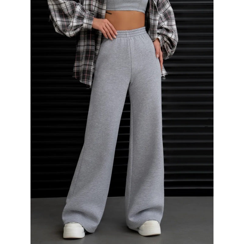 Women's flowing palazzo lounge pants with extra wide leg, elastic comfort waistband, and discreet side pockets Mune Fashion