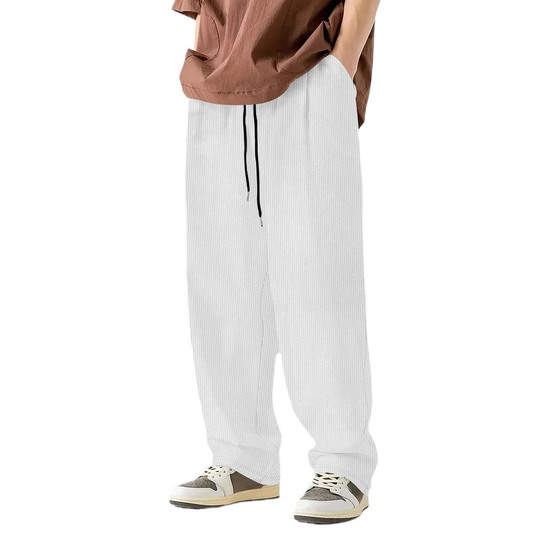 Men's loose Relax leisure pants made of ribbed jersey with drawstring, side pockets, and wide leg Mune Fashion