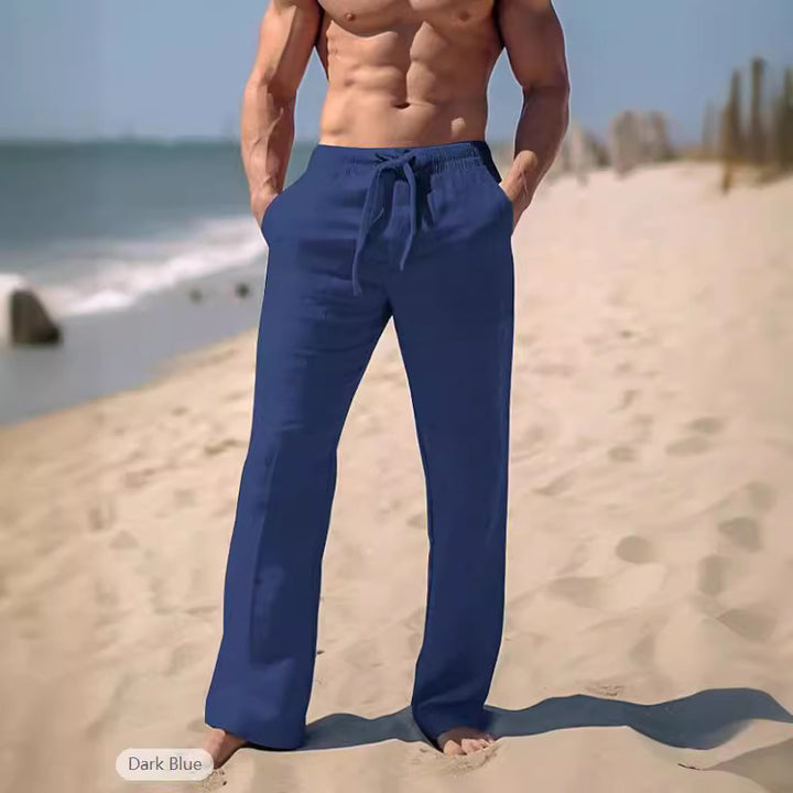 Men's loose resort leisure pants in palazzo style made of linen blend with drawstring and side inset pockets Mune Fashion