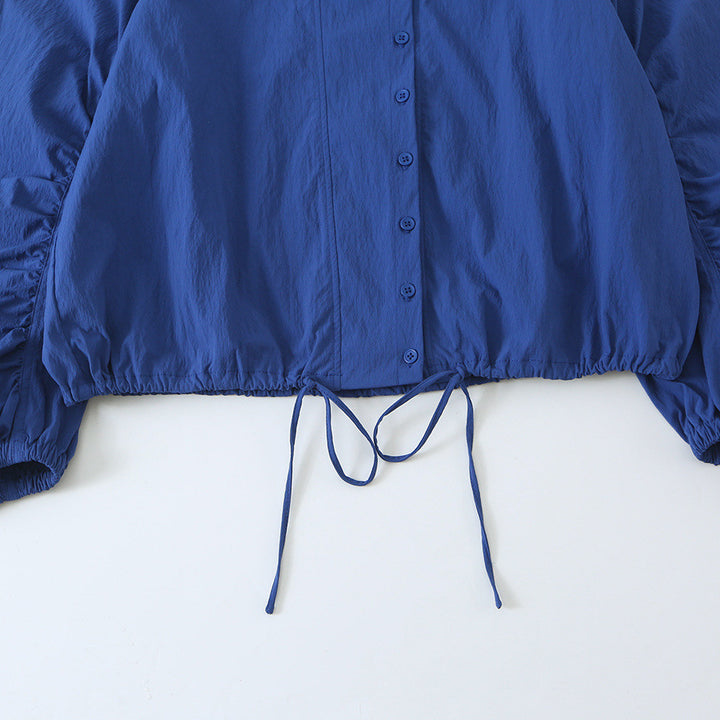 Women's Lightweight Cropped Windbreaker with Stand-Up Collar, Raglan Sleeves and Drawstring Mune Fashion