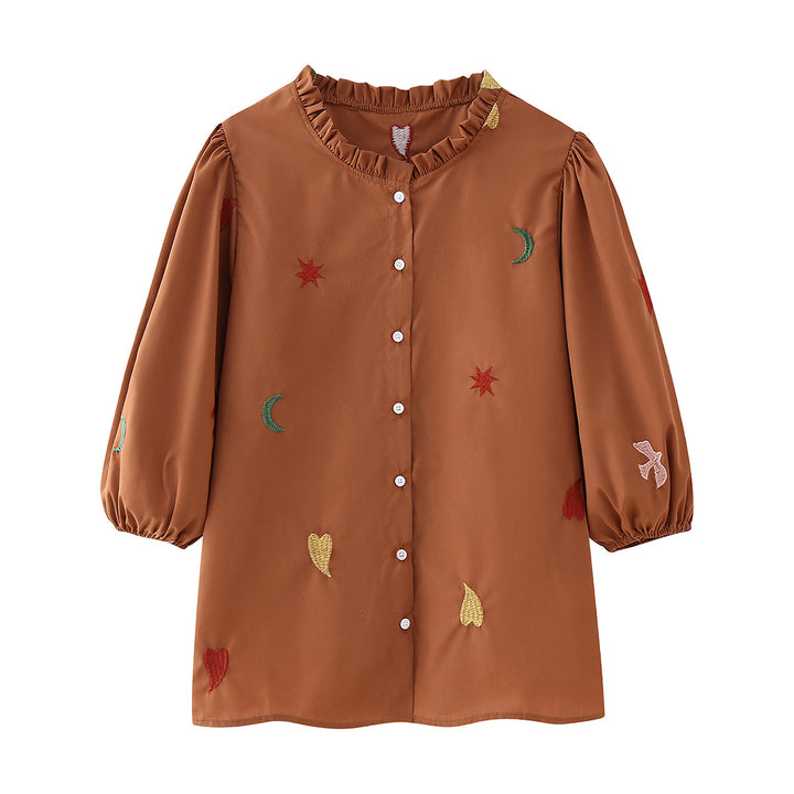 Ladies embroidered tunic blouse with ruffled collar, continuous button placket and balloon sleeves Mune Fashion