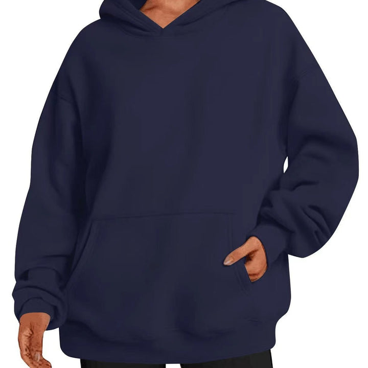 Women extra long oversized hoodie in boxy cut with kangaroo pocket and ribbed hem Mune Fashion