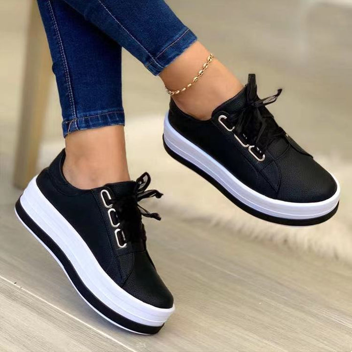 Women's platform sneakers with textured synthetic leather upper and extra high rubber platform Mune Fashion