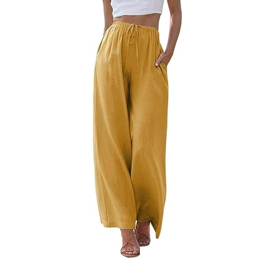Women's wide linen pants with elastic waistband, drawstring, and side pockets Mune Fashion