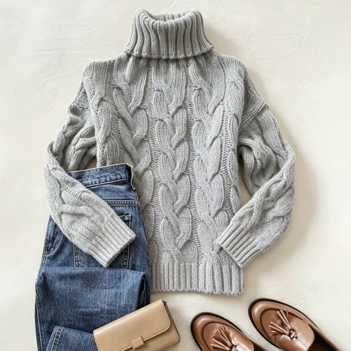 Women's chunky knit turtleneck sweater with distinctive cable patterns and ribbed cuffs Mune Fashion