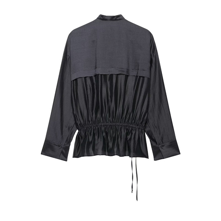 Women’s blouse with stand-up collar, drawstring waistline, and wide cuffs