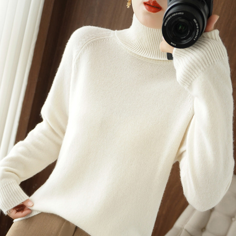 Women's turtleneck sweater made of soft wool blend with extended cuffs Mune Fashion