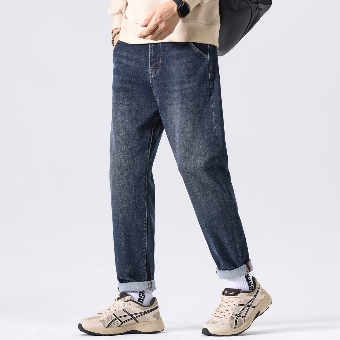 Men's tapered casual jeans with a mid-rise and subtle used wash Mune Fashion
