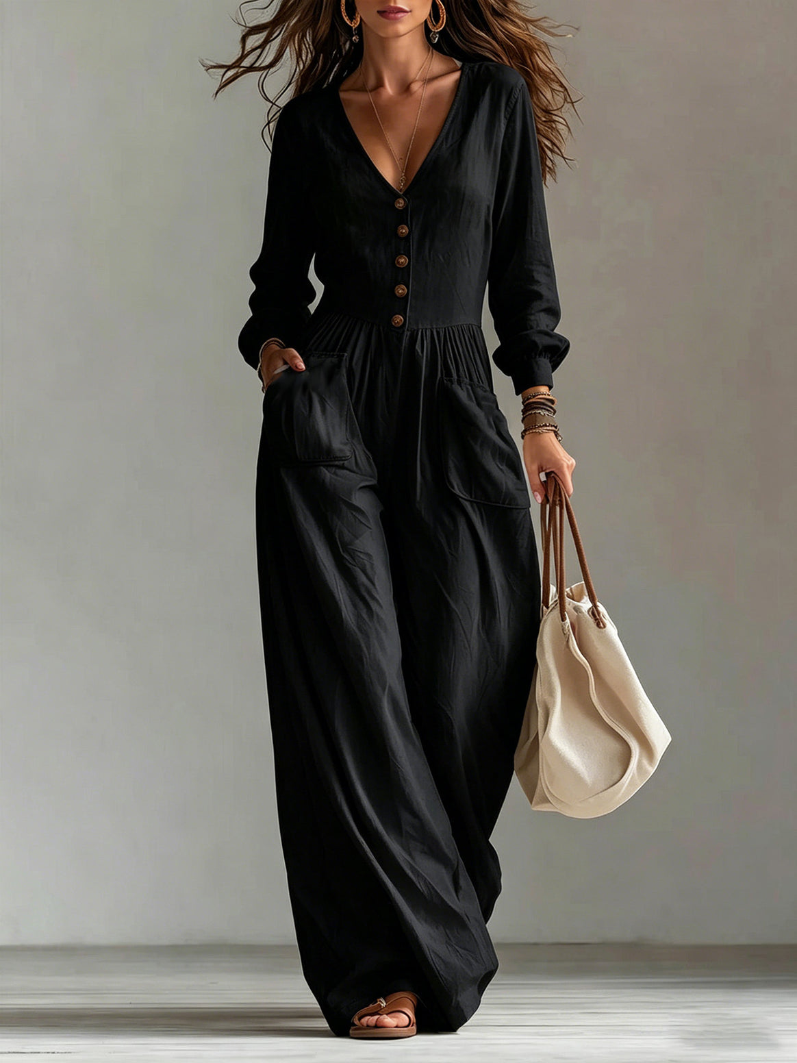 Ladies linen jumpsuit with V-neck, button placket and wide leg cut Mune Fashion