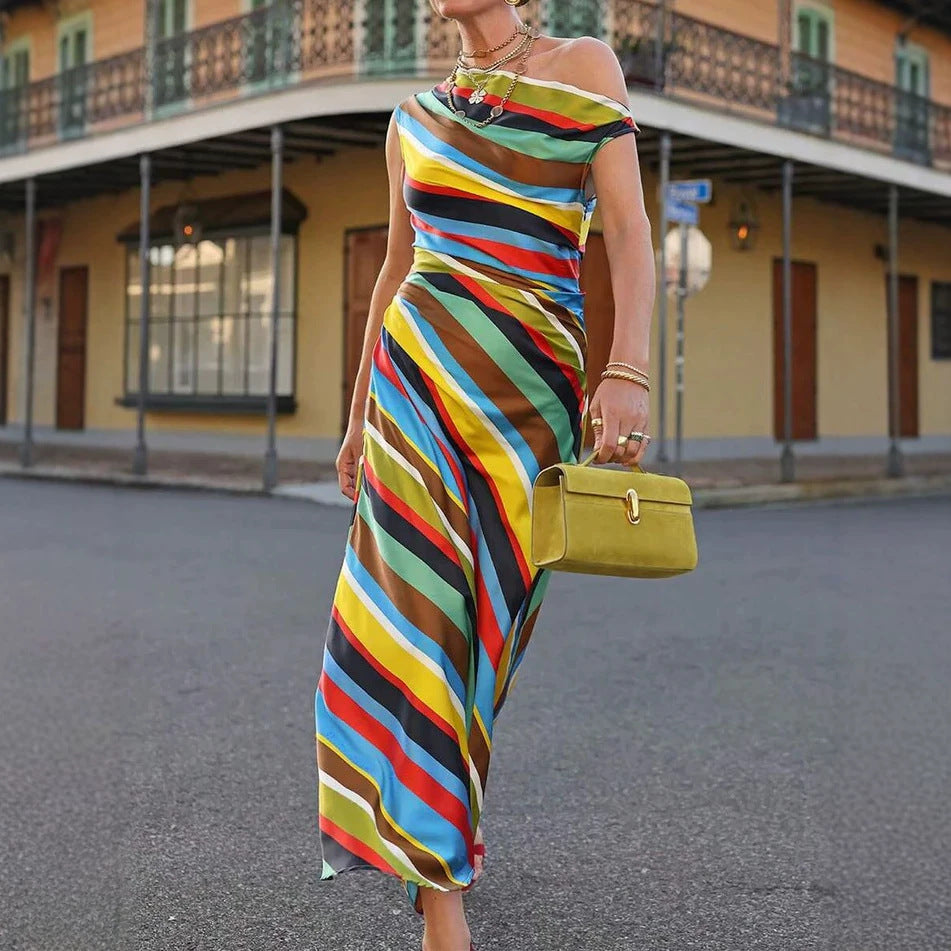 Women's asymmetrical off-shoulder maxi dress with diagonal stripe pattern and fitted silhouette Mune Fashion