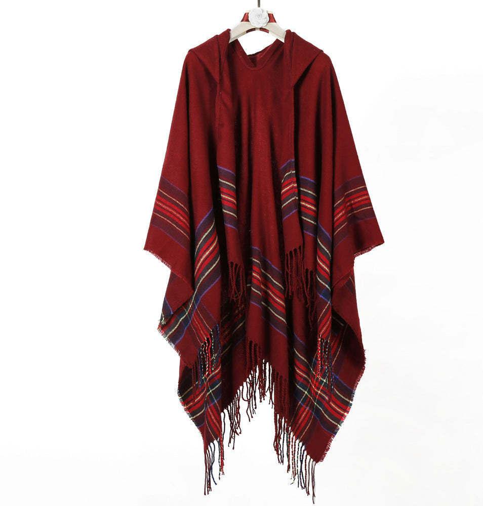Women's hooded cape poncho in tartan pattern with fringed hem made of soft wool blend Mune Fashion